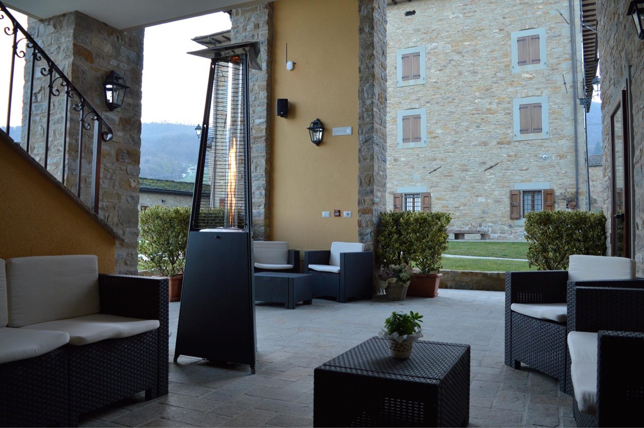 Italkero Falo Evo pyramid heaters on a restaurant patio