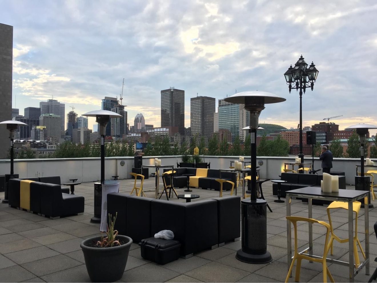 Commercial patio heaters installed across a restaurant rooftop